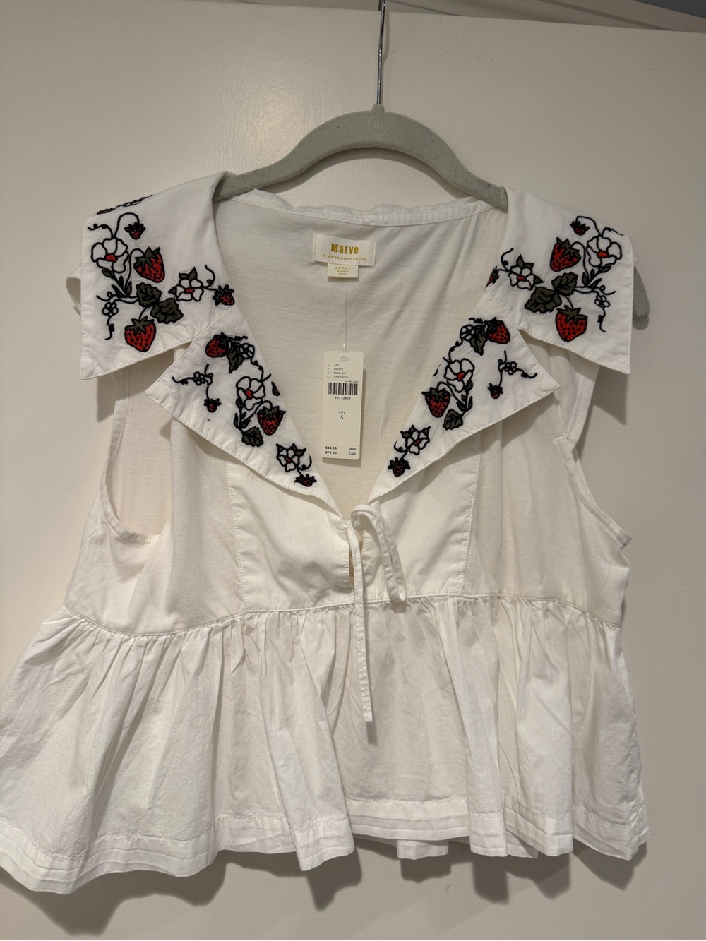 Maeve White Sleeveless Peplum Top with Embroidered Strawberry Collar